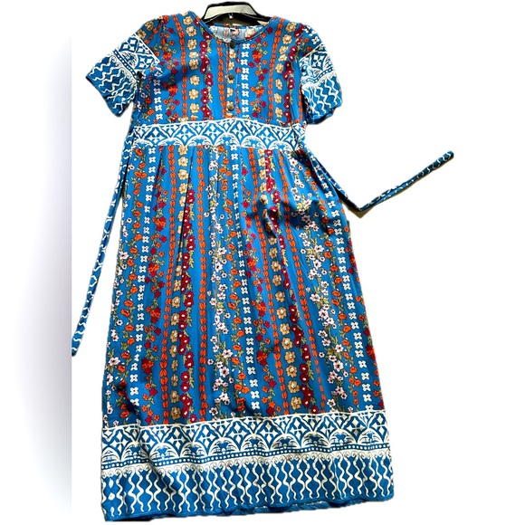 Floral patterns with wavy lines belt will make the edgy feminine appearance. NWT - Picture 2 of 2